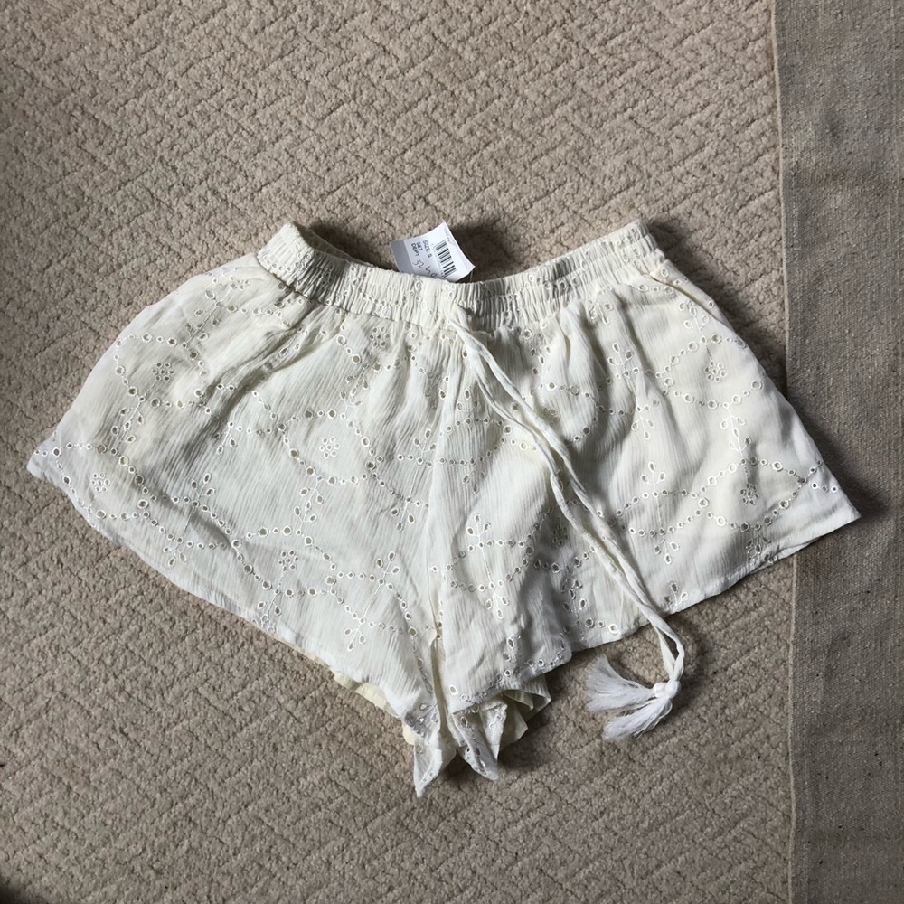 Glamours white crochet shorts